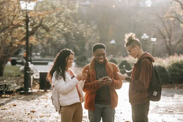 A group of strangers interacting with each other using mobile app